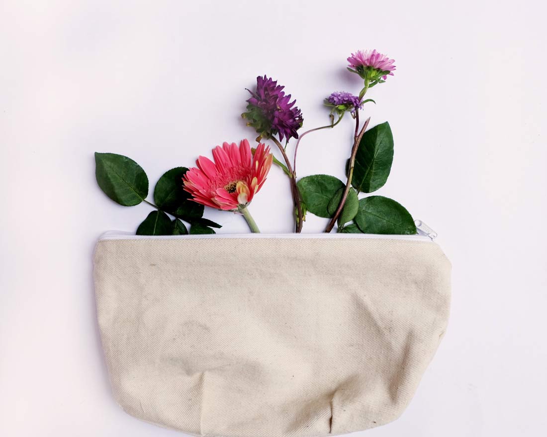 Natural makeup bag with flowers.